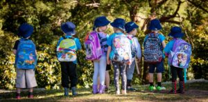 Group of early learners with backpacks at Bush Kindy - Suncoast Little Learners