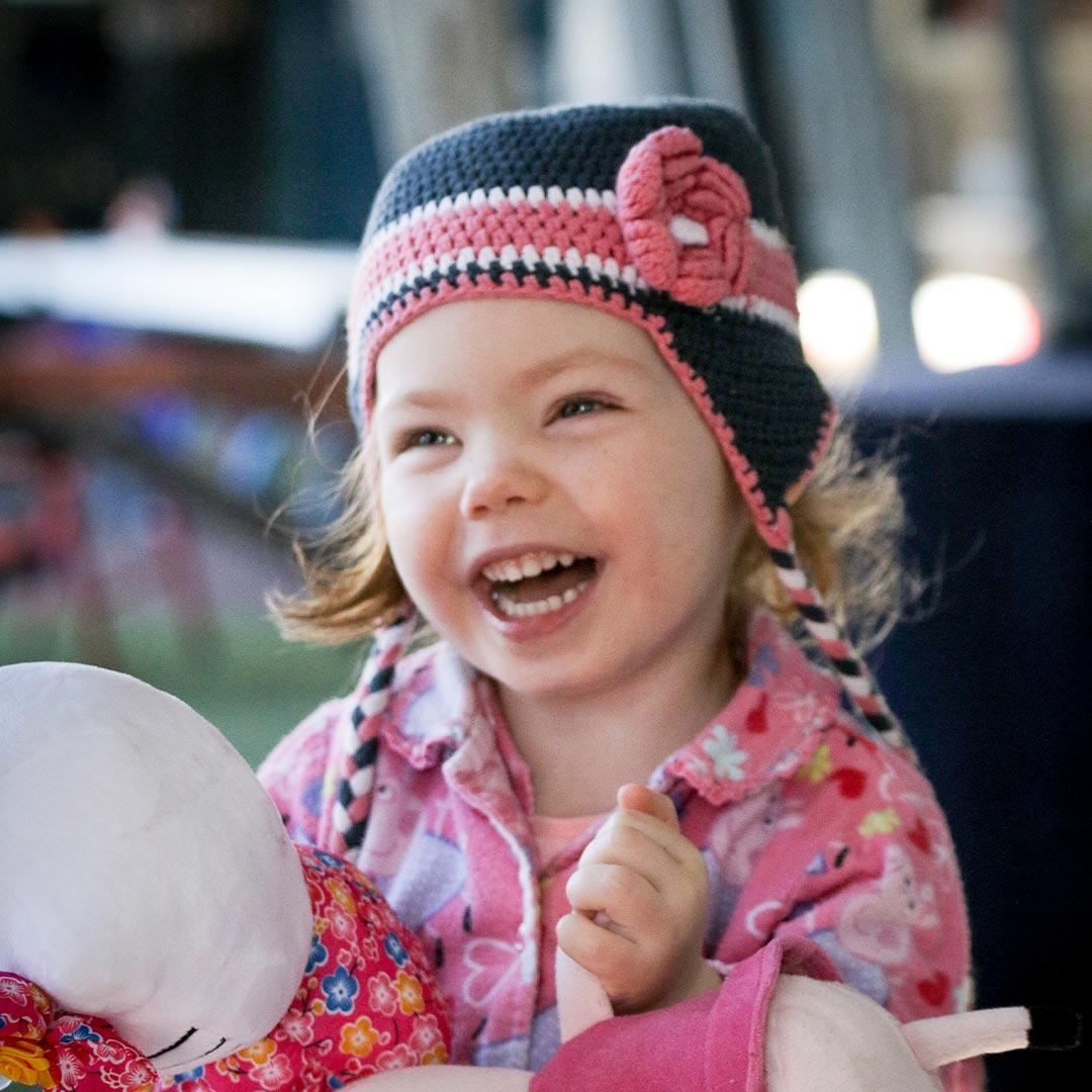 Early learner child with teddy bear at Suncoast Little Leaners, Woombye